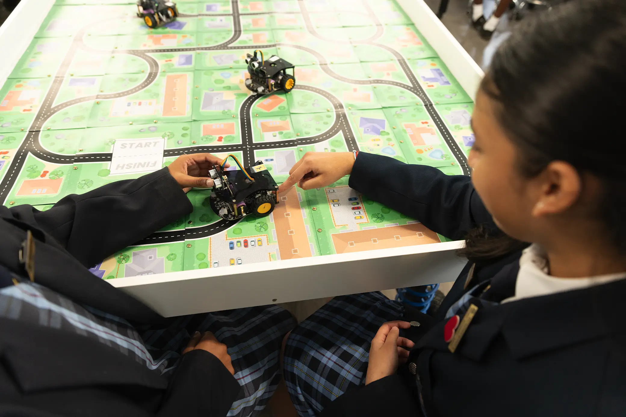 Students programming robots at Summerhill Prep
